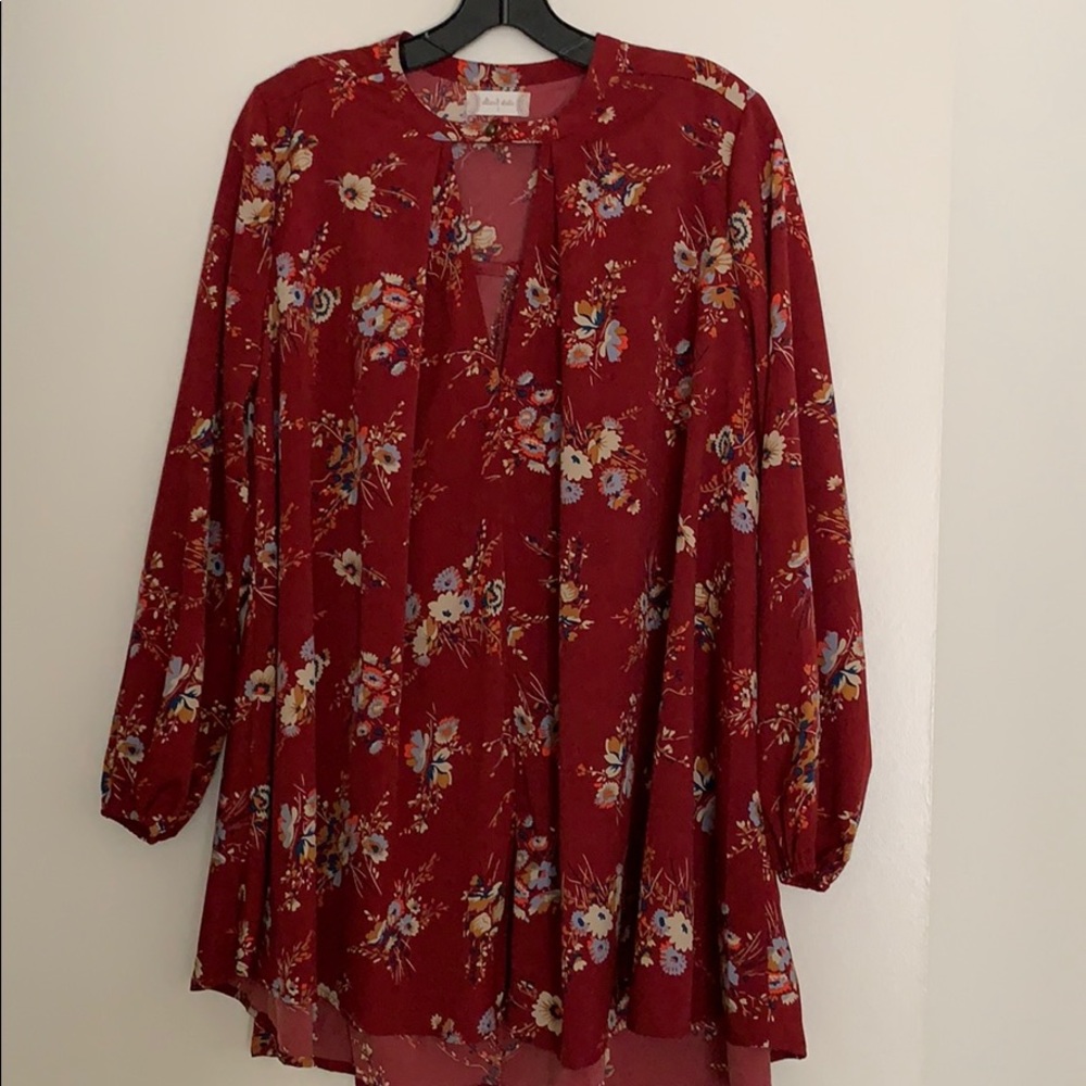 Long sleeve maroon mini dress with floral detail
